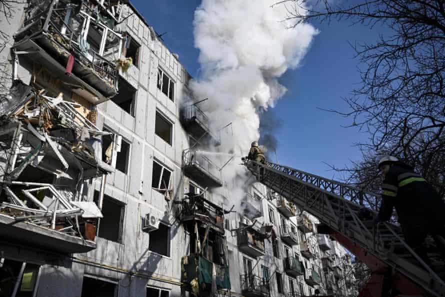 Firefighters at work after bombings on the eastern Ukraine town of Chuhuiv on February 24