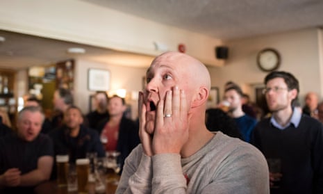 Leicester gather in the pub to watch their team play Arsenal.