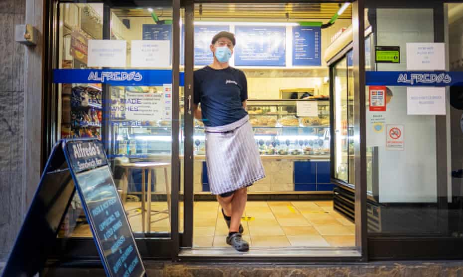 Alfred at the door of his shop in Moorgate in central London