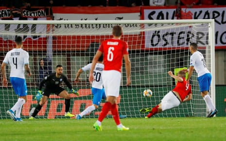 Austria’s Hinteregger scores their second goal.