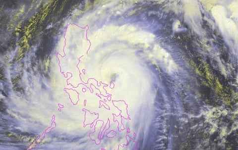 Satellite image showing the swirling winds of the typhoon