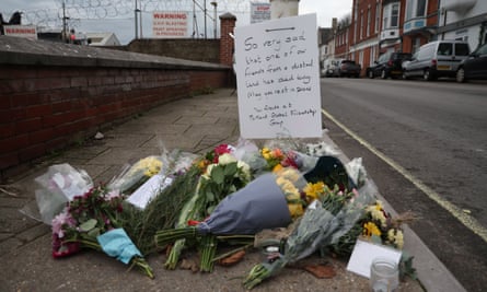 Flowers left in tribute to the asylum seeker onboard the Bibby Stockholm who died