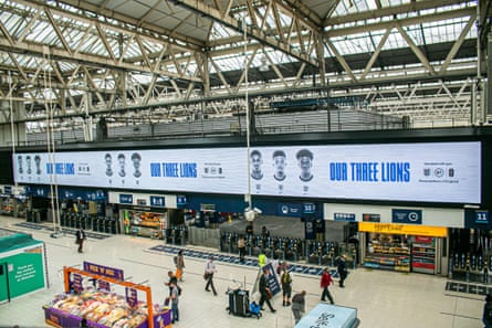 An electronic billboard displayed above the concourse at Waterloo Station supporting England footballers Marcus Rashford, Jadon Sancho and Bukayo Saka after the racial abuse they received on social media for missing the penalties which resulted in England losing the Euro 2020 final against Italy