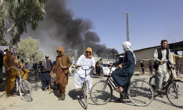 Smoke rises after fighting between the Taliban and Afghan security personnel in Kandahar on Thursday.