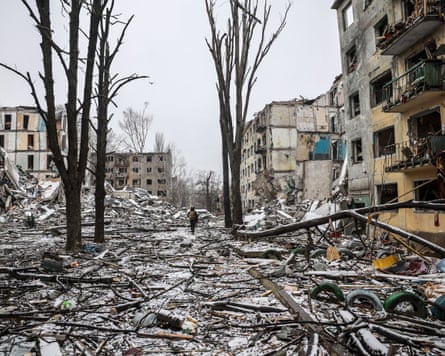 A Ukrainian serviceman walks in the rubble of residential buildings in Kostyantynivka, Ukraine