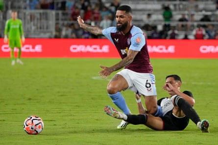 Fulham’s Sasa Lukic, right, tries to stop Aston Villa’s Douglas Luiz during a friendly in July
