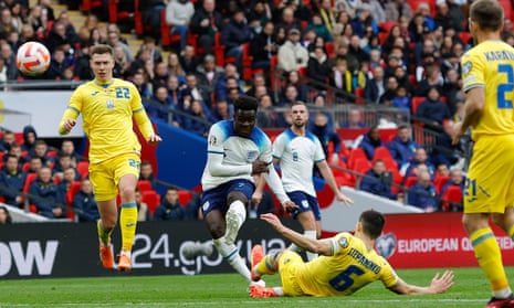 Bukayo Saka scores his stunning goal for England at Wembley