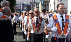 Orangemen take part in the annual 12 July parade in Belfast. The Orange Order says faith alone can get a person to heaven.