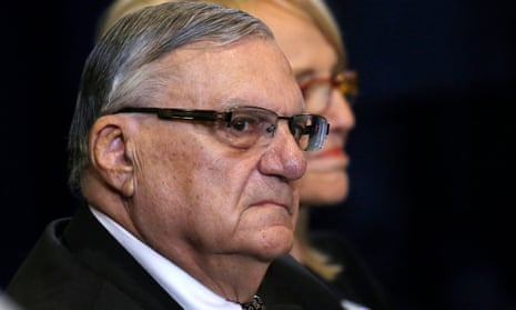 Sheriff Joe Arpaio is pictured waiting for Donald Trump during a campaign event in Phoenix, Arizona.