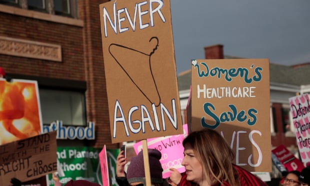 Supporters of Planned Parenthood rally outside a clinic in Detroit, Michigan.