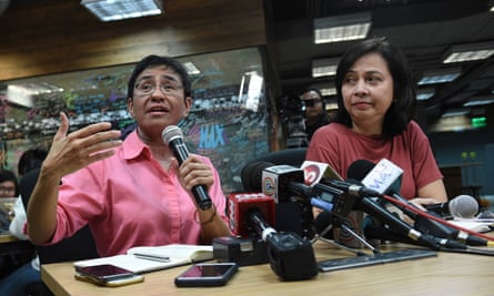 Maria Ressa (L), chief executive and editor of online portal Rappler, speaks during a press conference at their office in Manila.