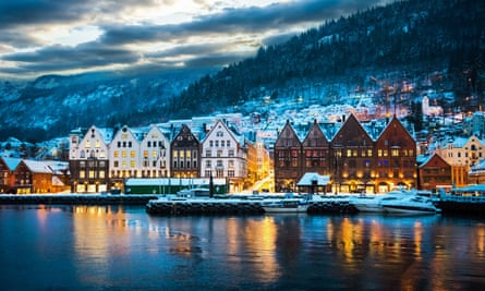Old houses on Bergen’s medieval harbour, lit up in the evening.