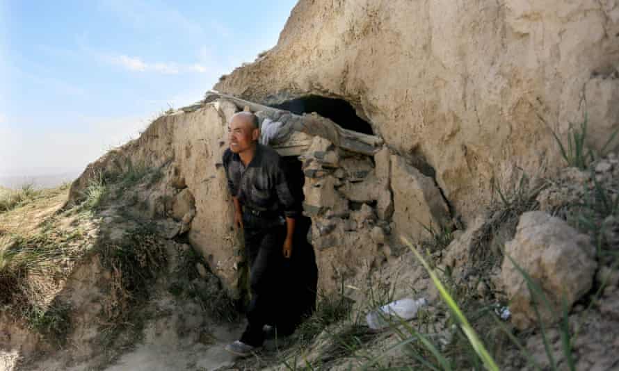 Zhu Keming outside the cave.