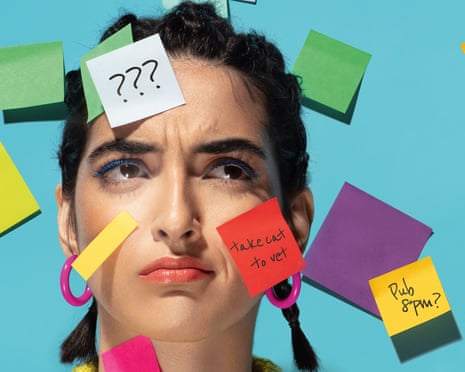 Woman with post-its stuck to her face
