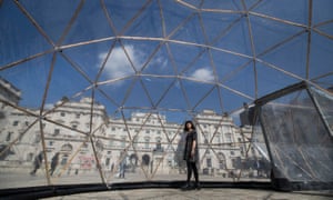 A visitor inside one of Michael Pinsky’s Pollution Pods.