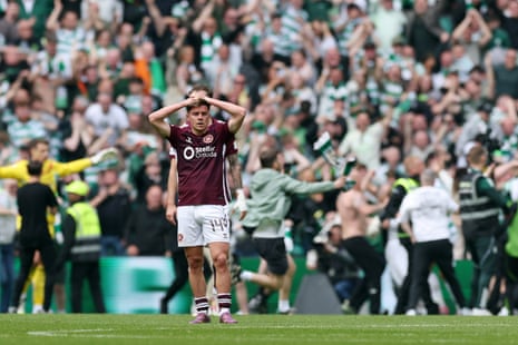 Cammy Devlin shows his despair after Celtic score thei third goal.