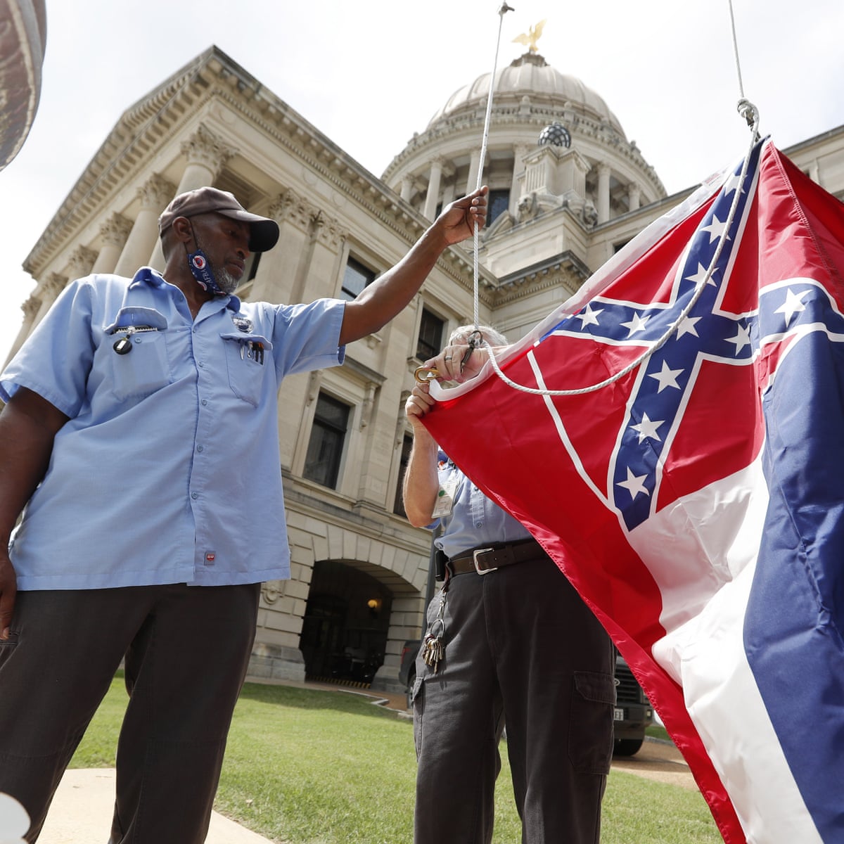 Governor Signs Historic Bill To Remove Confederate Symbol From Mississippi Flag Us News The Guardian