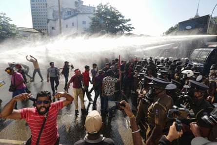 Sri Lankan police use teargas and water cannon to disperse anti-government protesters.