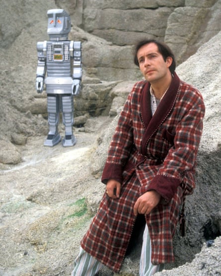 Simon Jones as Arthur Dent, with Marvin the Paranoid Android in the TV series.