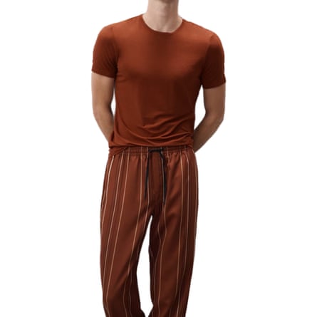 A pair of warm brown Marks & Spencer pyjamas. The top is a plain T-shirt and the loose bottoms have light pinstripes.