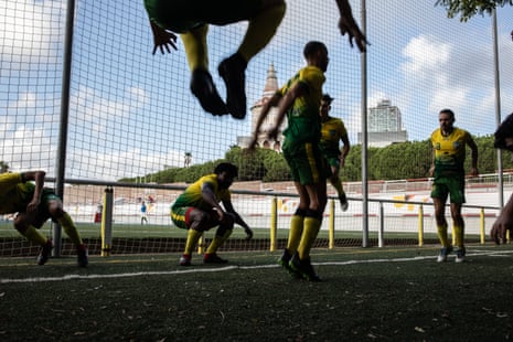 Young people playing football at FC Darna in Barcelona