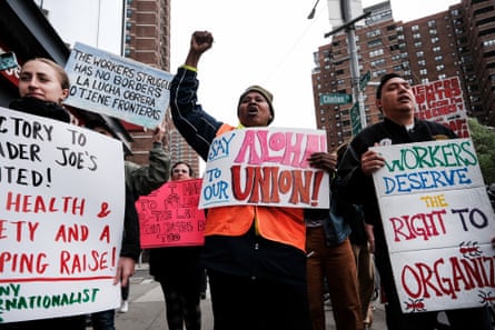 People hold pro-union signs