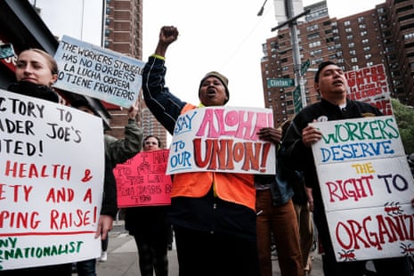 Trader Joe’s employees rally at in lower Manhattan in support of forming a union on 18 April 2023.