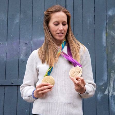 Helen Glover poses with her two olympic gold medals, which she won at London 2012 and Rio 2016.