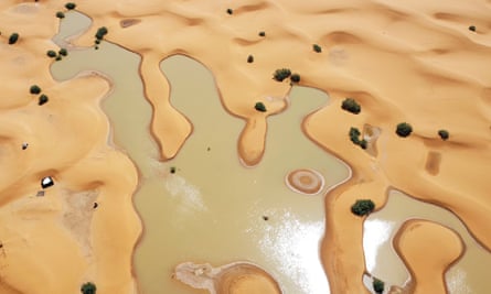 A view of lakes caused by heavy rainfall between sand dunes in the desert town of Merzouga, near Rachidia, southeastern Morocco