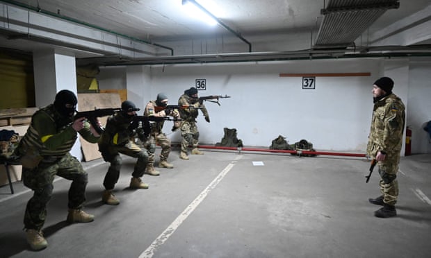 Ukraine military reserve forces take part in training in an underground garage