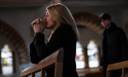 Nicci (Sharon Horgan) prays in a church in Best Interests.