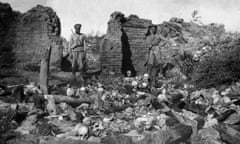 A picture released by the Armenian Genocide Museum-Institute dated 1915 purportedly shows soldiers standing over skulls of victims from the Armenian village of Sheyxalan in the Mush valley, on the Caucasus front during the First World War.
