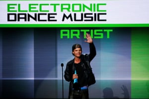 ‘Lyrics are important, but it’s hard because English isn’t my first language – although it feels like it is these days! I grew up with amazing melodies, so getting that right on a song has always been the key thing for me, but there’s no reason why a great melody doesn’t deserve great lyrics.’ Avicii accepts the favorite electronic dance music artist award at the 41st American Music Awards in Los Angeles, California.
