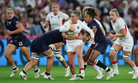Natasha Hunt is tackled during England’s Rugby World Cup match against USA.