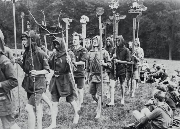 Boys and men take part in the Touching of the Totems rite, 1925.