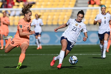 The United States' Emily Fox, right, and the Netherlands' Katja Snoeijs compete for the ball.