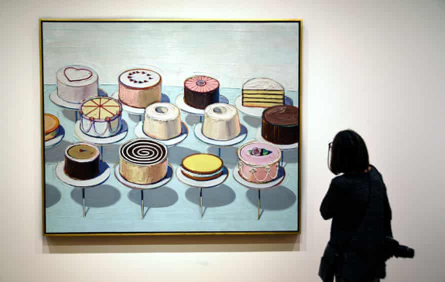 A visitor admires Cakes, a 1963 painting by Wayne Thiebaud, at the National Gallery of Art in Washington DC.