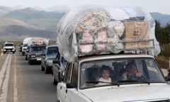 Ethnic Armenians from Nagorno-Karabakh leaving Azerbaijan by car on Friday