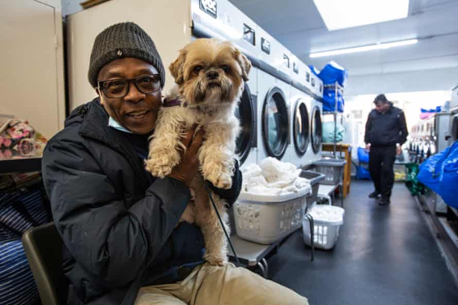 Customer and regular visitor Arthur Mafonko with his dog Milo.