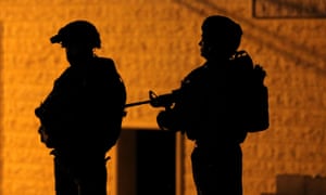 Israeli troops seen during a night raid on the West Bank last week