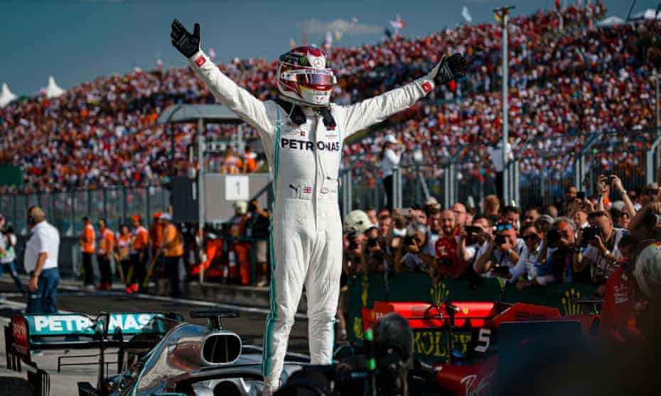 Lewis Hamilton celebrates his win for Mercedes at the Hungaroring.