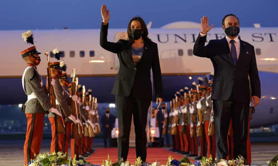 Harris and Guatemala’s minister of foreign affairs, Pedro Bolo, wave at her arrival ceremony in Guatemala city in June.