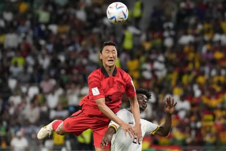 South Korea’s Jung Woo-young and Ghana’s Mohammed Kudus challenge for the ball.