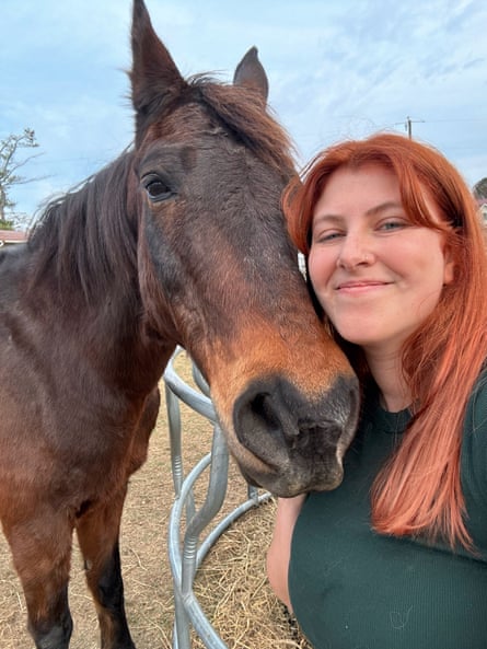 Sydney Bauer with a brown horse.