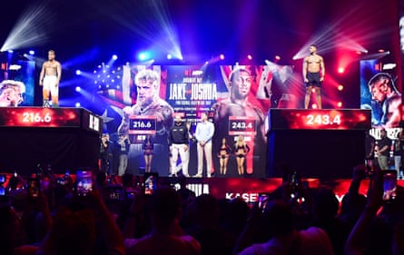 Jake Paul and Anthony Joshua during a public weigh-in