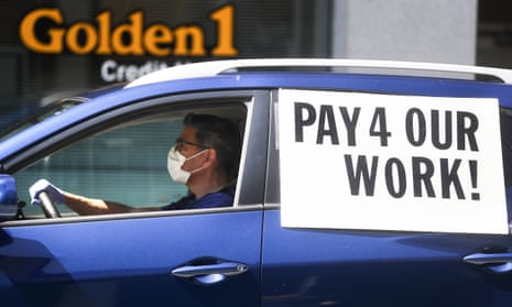 Uber and Lyft drivers held a protest in Los Angeles after being denied unemployment insurance during the pandemic, April 2020.