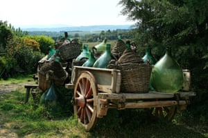 Large jugs (carboy, demijohn) on a wagon, Chianti Region, Tuscany, Italy