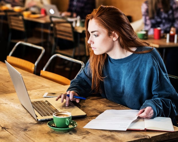 A woman working on laptop computer