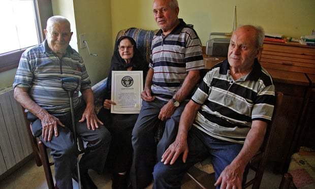 Consolata Melis with her three brothers in her house in Perdasdefogu in 2012, just before her 105th birthday.