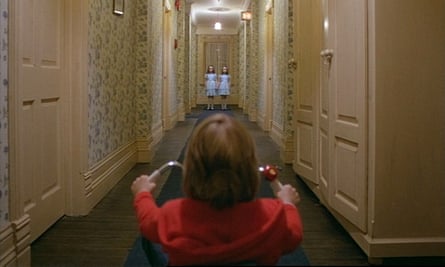 Lloyd on his trike in The Shining, riding toward Lisa and Louise Burns, the Grady twins.